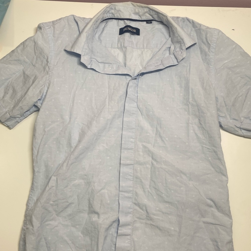 Open to all offers!  Blue button top